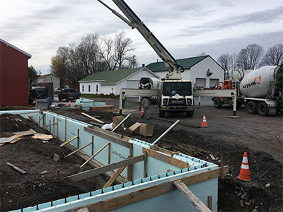Concrete footers being poured